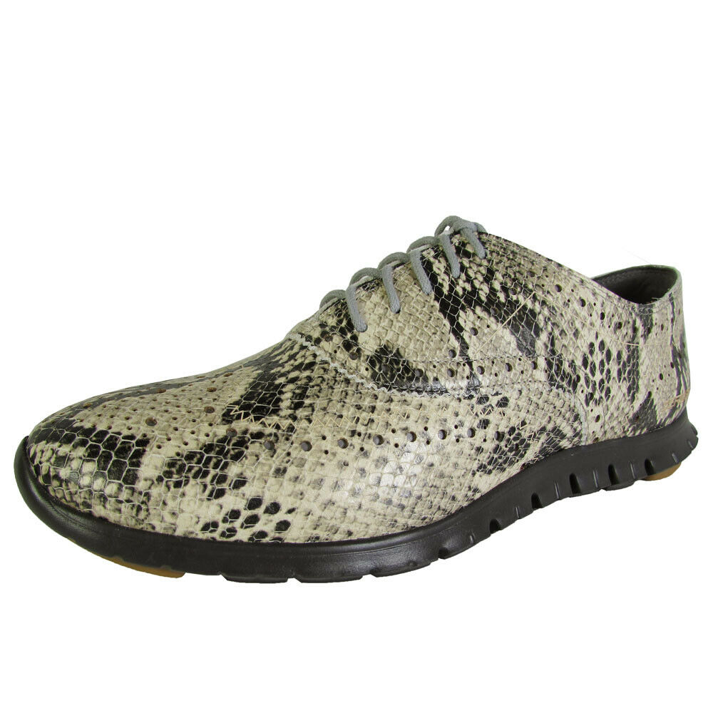 Cole Haan Womens ZeroGrand Wingtip Oxford Walking Shoe, Roccia/Pavement, US 5